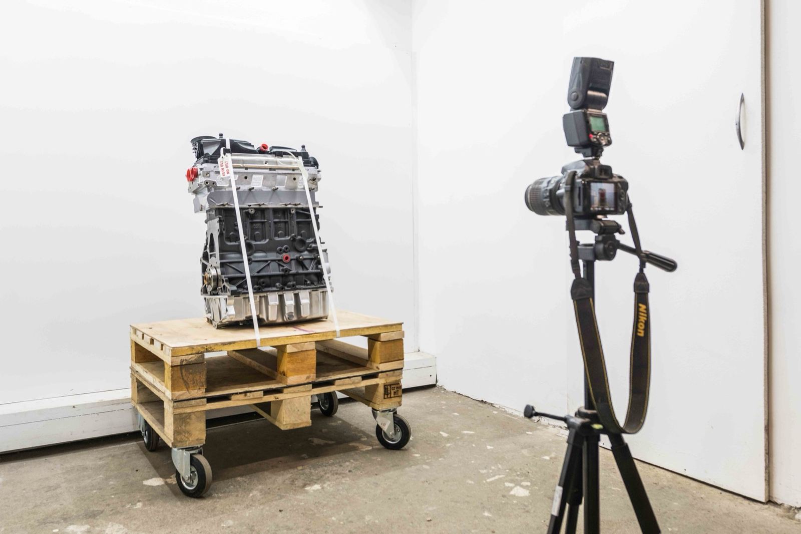 Fully overhauled engine being photographed for the online shop